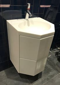 Тумба из искусственного камня с выдвижными ящиками Тумба из искусственного камня с выдвижными ящиками